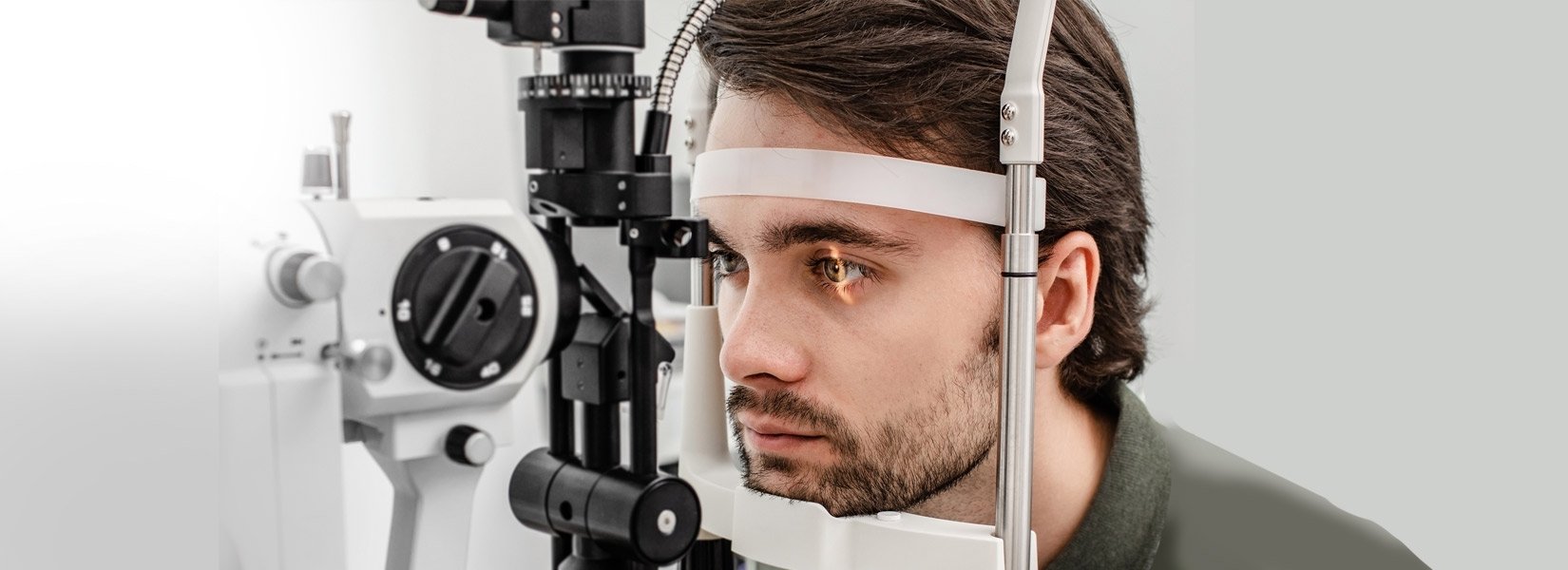 young man during eye exam in Centennial